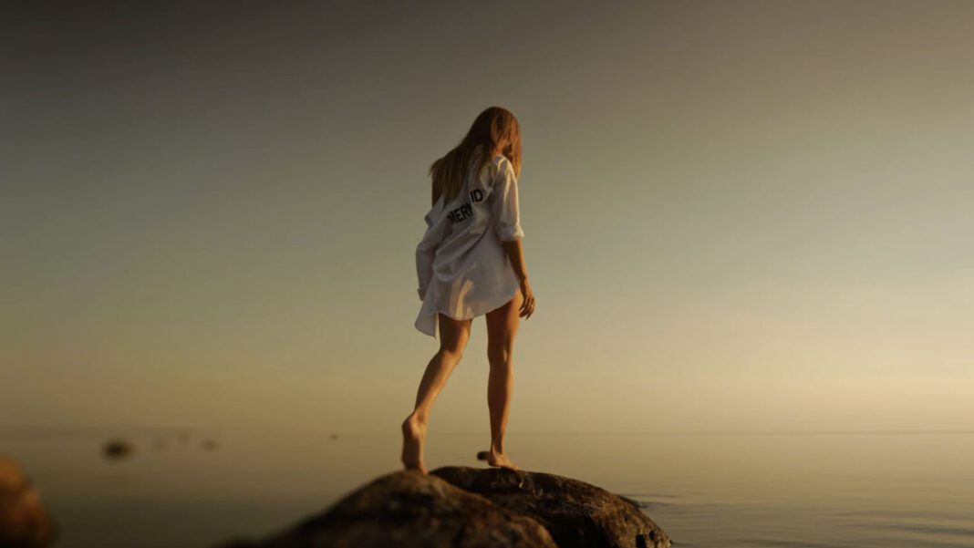 girl alone walking on rocks
