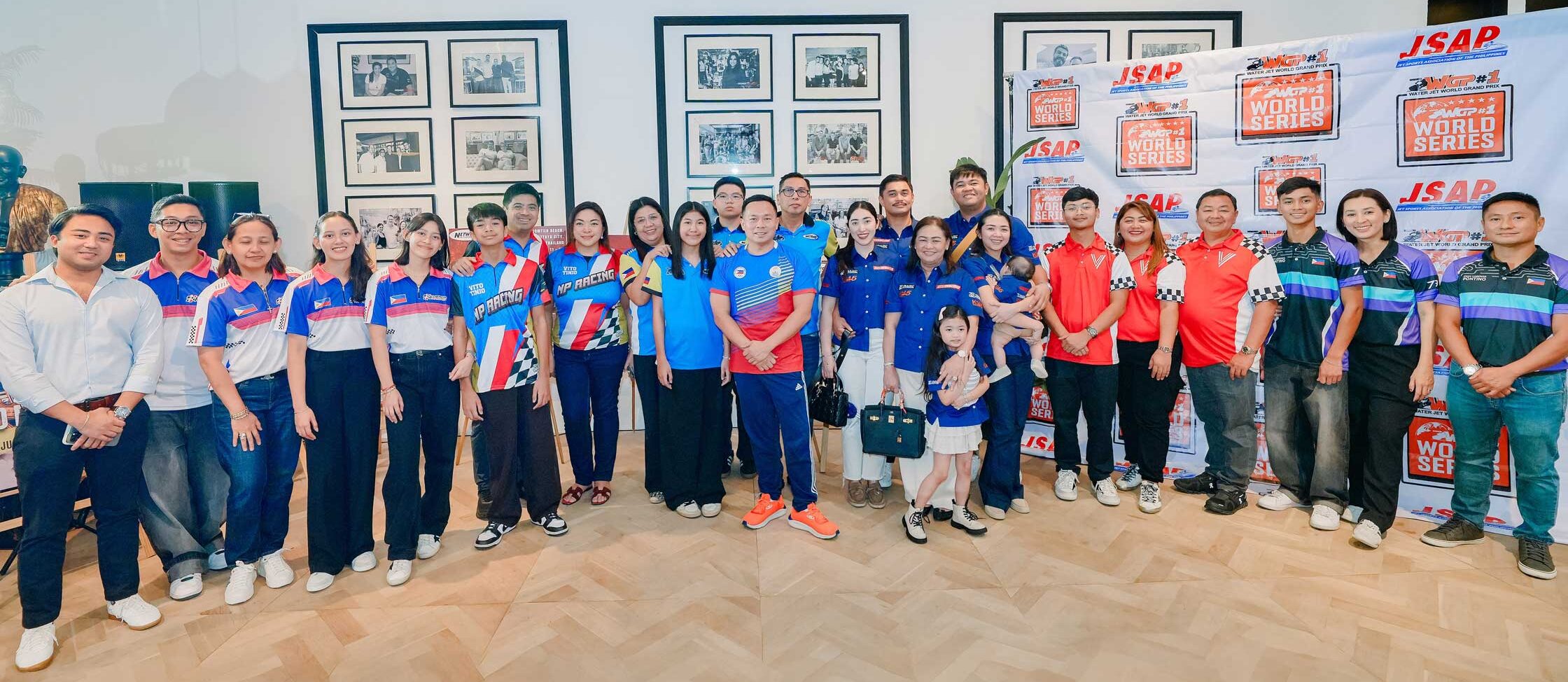 The Philippine delegation proudly poses at the press conference with their parents and coaches, showcasing a strong support system and commitment to excellence.